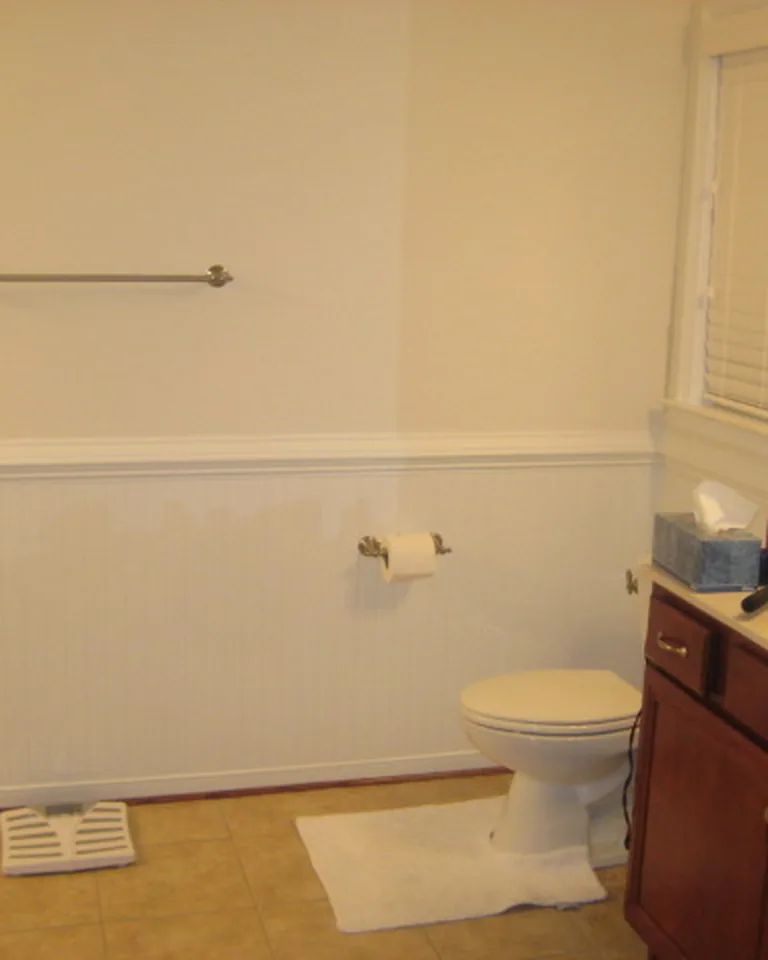 12 Ways to Cover an Ugly Ceiling Without Making the Room Feel Heavy 7 White beadboard ceiling panels on a porch