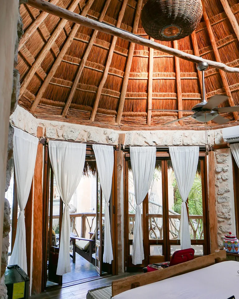 12 Ways to Cover an Ugly Ceiling Without Making the Room Feel Heavy 16 Bright bedroom with a clean finished ceiling