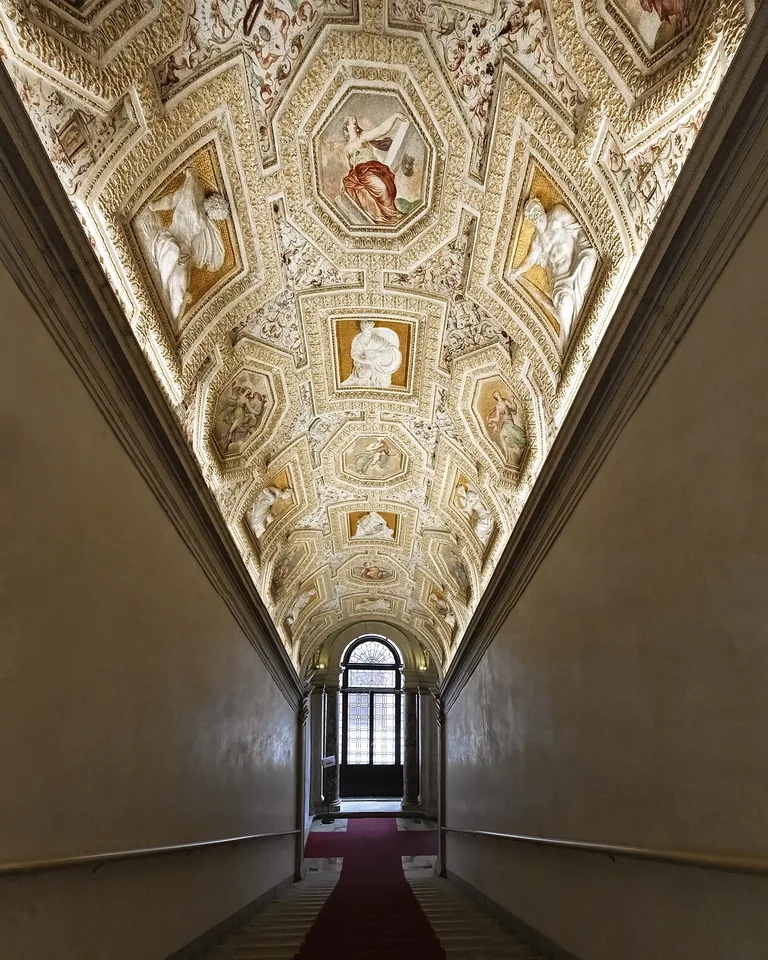 12 Ways to Cover an Ugly Ceiling Without Making the Room Feel Heavy 14 Coffered ceiling with recessed panels in a dining room