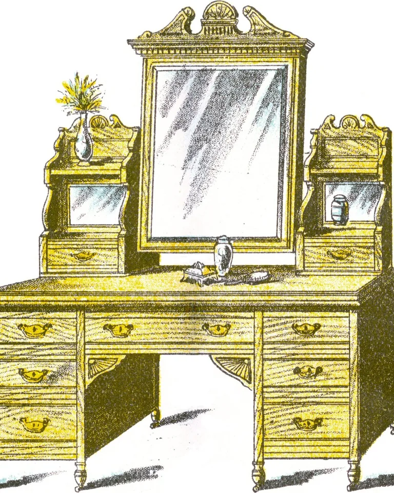Closet dressing area with a vanity table, mirror and bench