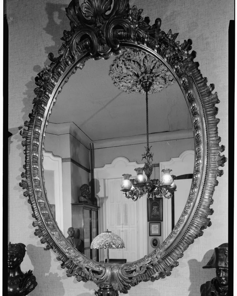 12 Ways to Cover an Ugly Ceiling Without Making the Room Feel Heavy 15 Decorative ceiling medallion around a chandelier