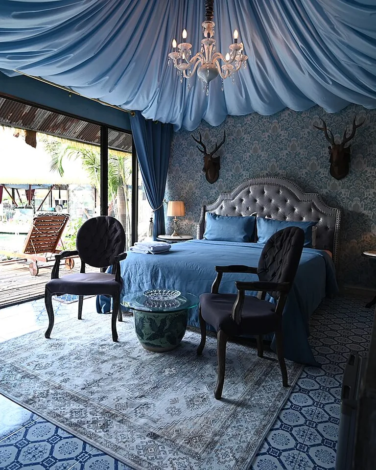 12 Ways to Cover an Ugly Ceiling Without Making the Room Feel Heavy 4 Bedroom with patterned wallpaper applied to the ceiling