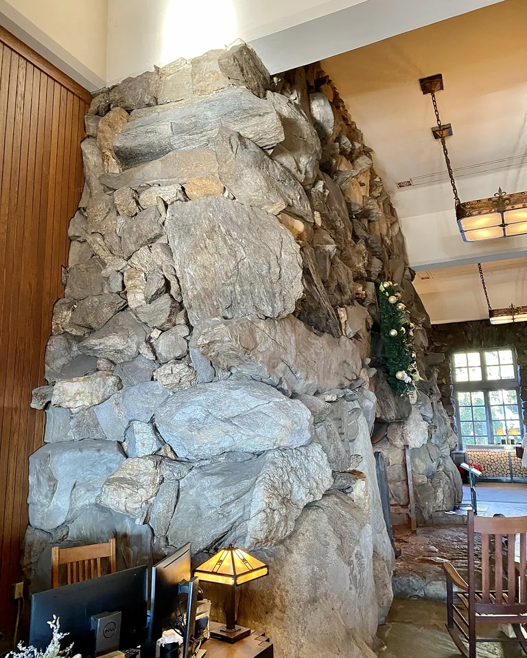 11 Shiplap Fireplace Ideas for a Cozy, Finished Living Room 9 Shiplap fireplace wall paired with a stacked stone firebox surround