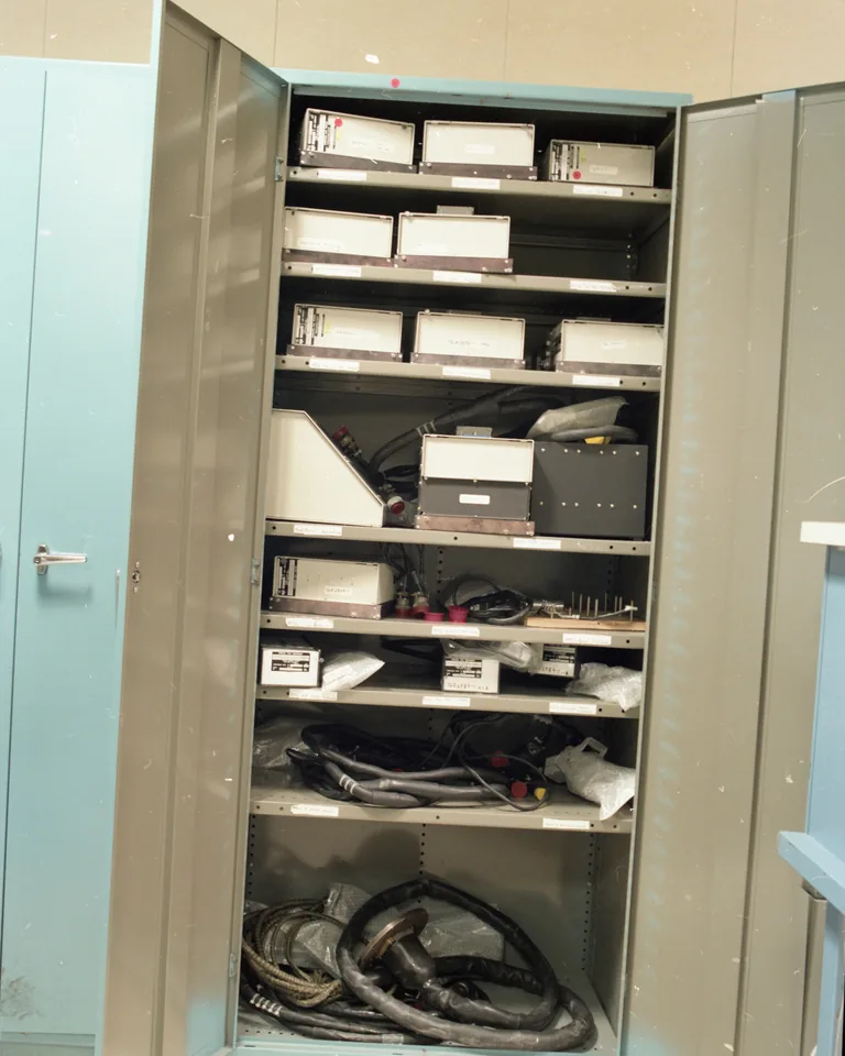 Organized walk-in closet with his and hers clothing zones