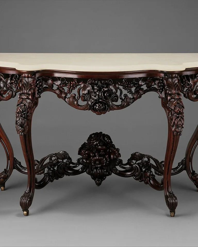 Narrow entryway console styled as a Thanksgiving serving station with autumn decor