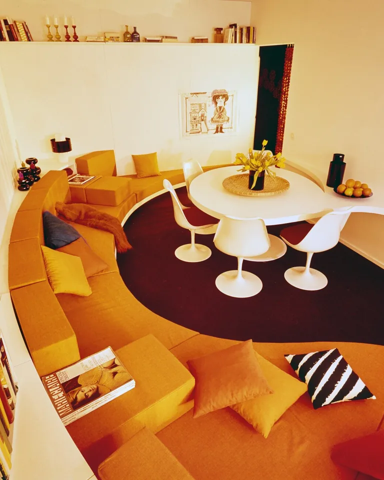 Modern living room with fireplace and large windows