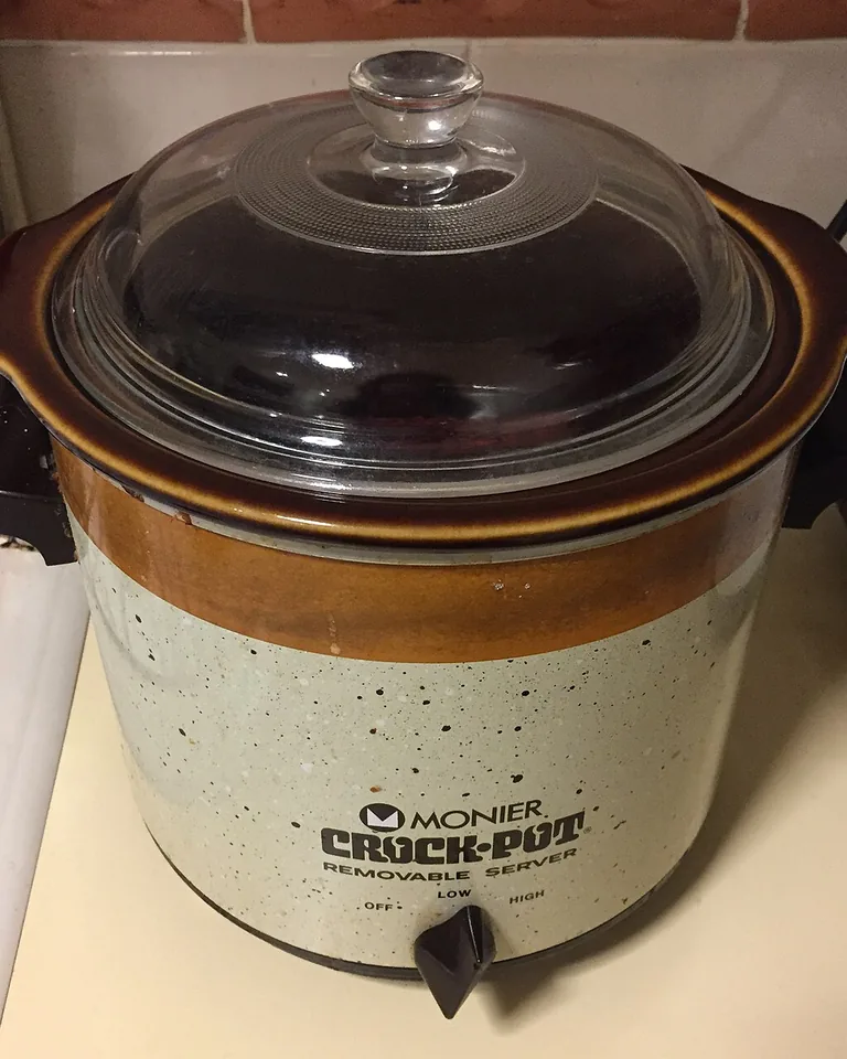 How to Make Your Home Smell Amazing Without Air Fresheners (11 Natural Ways) 8 Orange slices and cinnamon sticks simmering in a pot on a kitchen stove