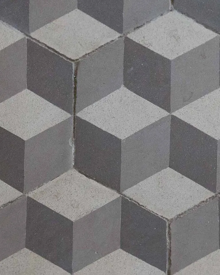 Hexagon floor tile in white and gray in a farmhouse bathroom