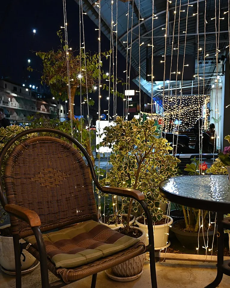 12 Small Balcony Color Palette Ideas That Make Tiny Outdoor Spaces Look Bigger 2 Small balcony styled with layered outdoor cushions and rug