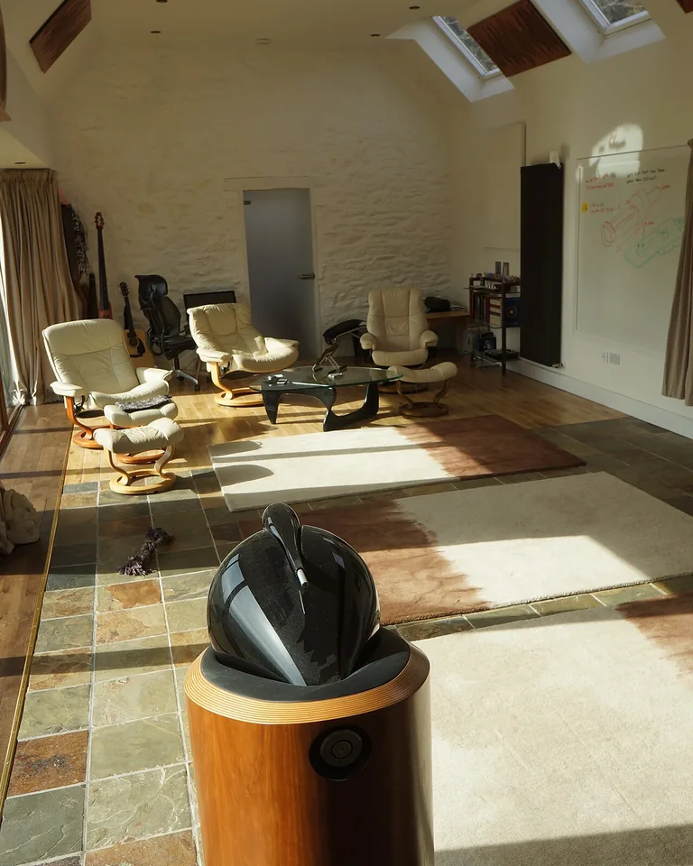 How to Brighten a Dark Room: 15 Fixes That Actually Work 15 Minimalist tidy living room with clear surfaces and open sightlines