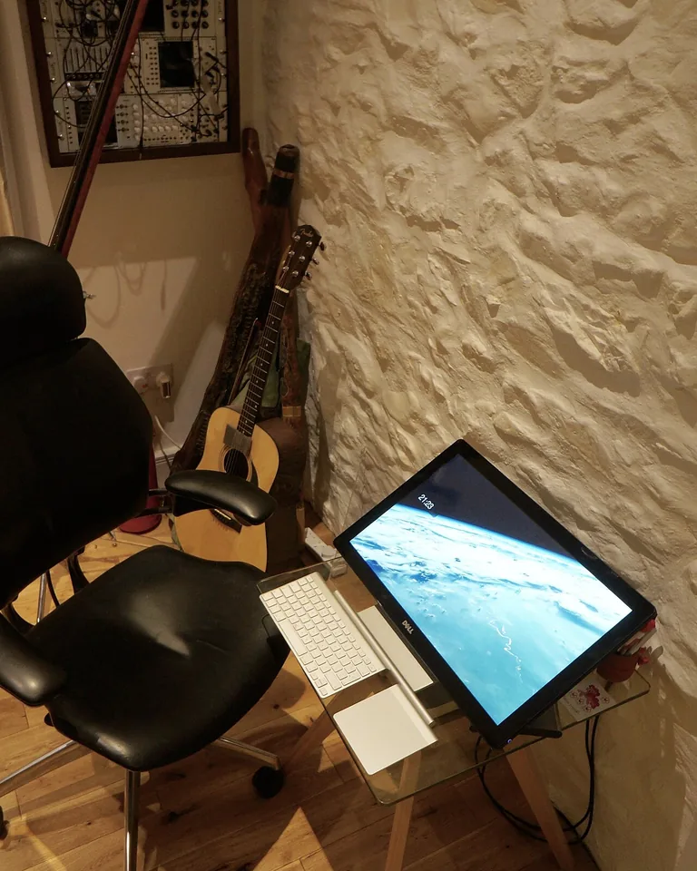 12 Gaming Room Ideas for Couples That Leave Room for Both Players 14 Compact gaming nook in a small apartment with smart storage