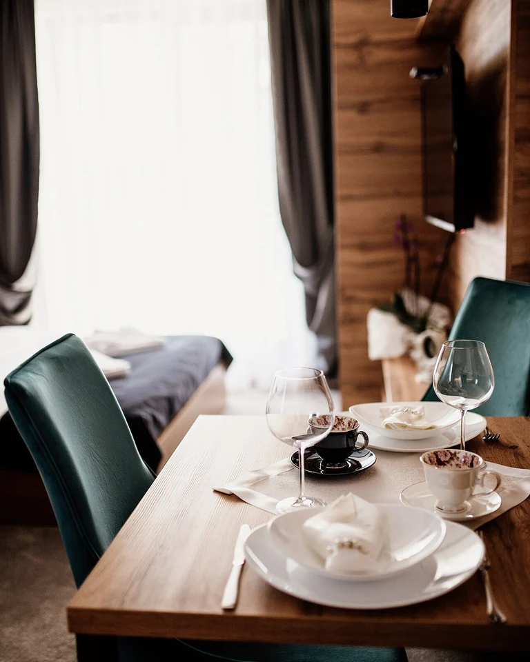 How to Make a Dining Room Look Formal: 12 Ideas That Work in Any Home 9 Warm layered lighting in an elegant formal dining room