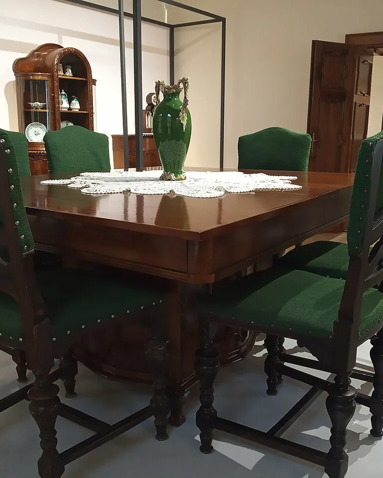 How to Make a Dining Room Look Formal: 12 Ideas That Work in Any Home 4 Upholstered dining chairs around an elegant wood table