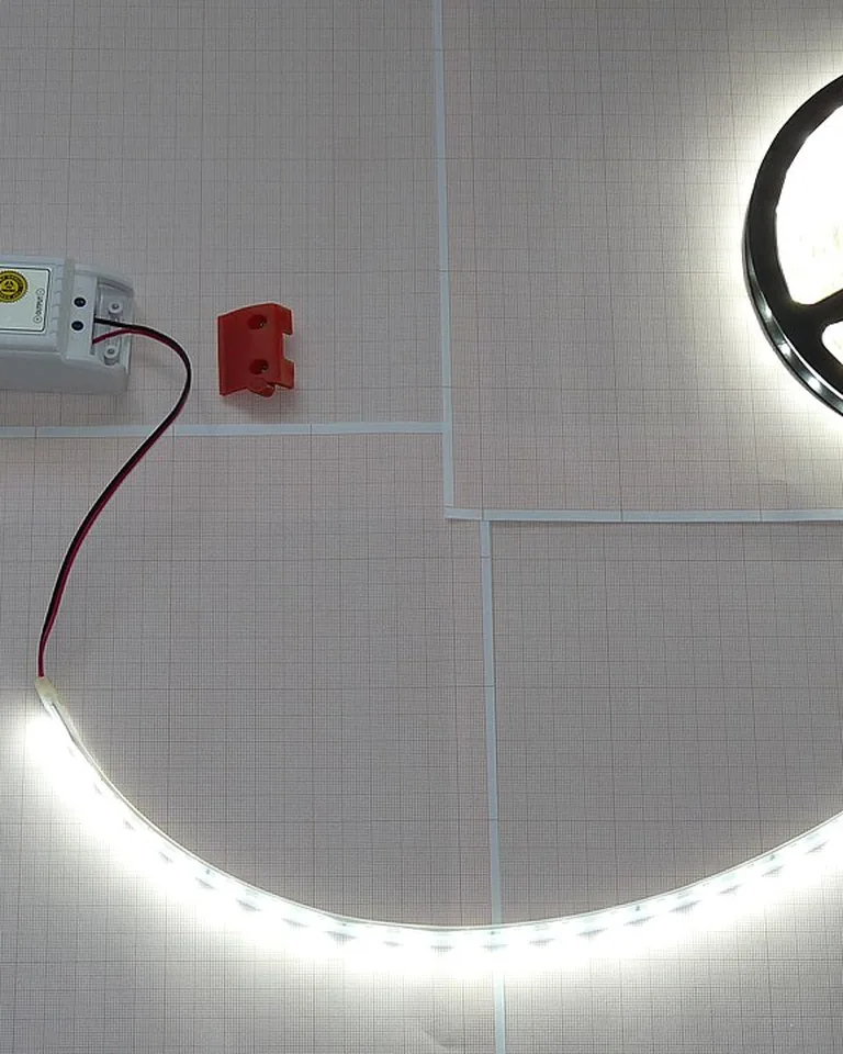 LED strip glowing in a single accent color behind a gaming monitor