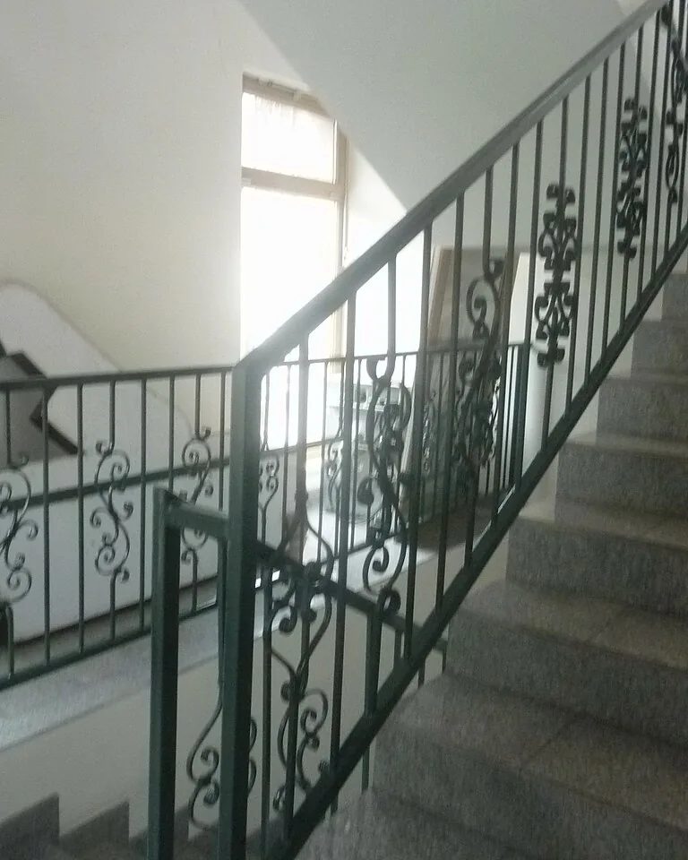 Modern staircase interior with paneled walls