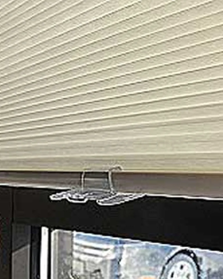 14 Window Treatment Ideas That Make Any Room Look Finished 6 Cellular honeycomb shades covering a window