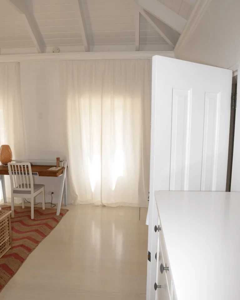 14 Window Treatment Ideas That Make Any Room Look Finished 3 Layered sheer curtains softening daylight in a bedroom